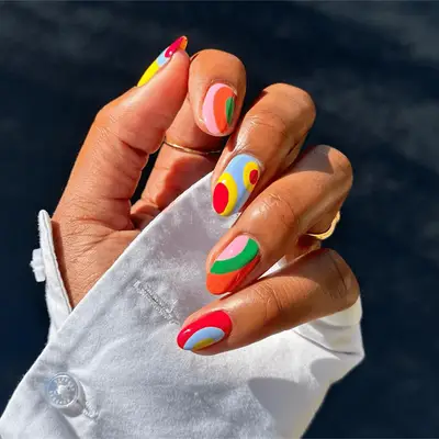 multi-colored neon nails in groovy art