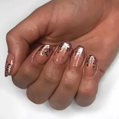 Chunky silver glitter to tan nude ombre nails