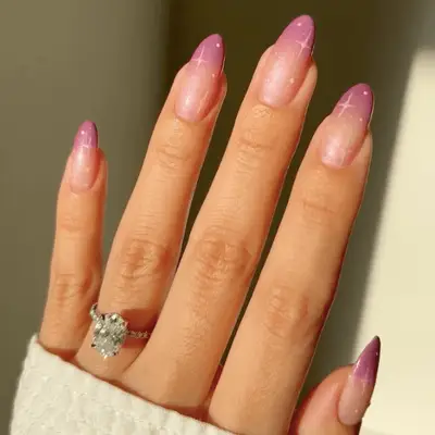 Subtle pink-to-silver glitter ombre nails