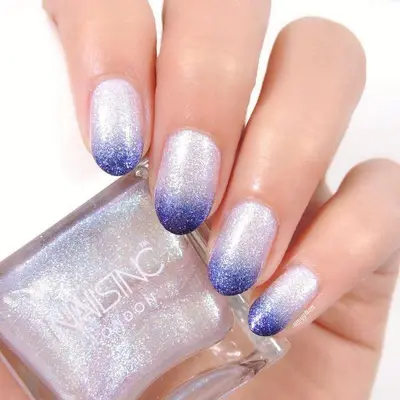 Deep blue to silver glitter ombre nails