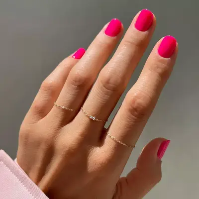 short square nails with shiny hot pink polish