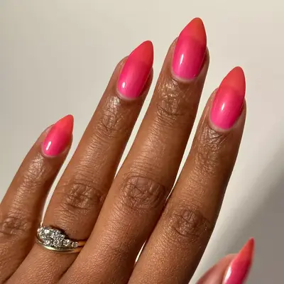 Short coffin nails with hot pink sheer polish