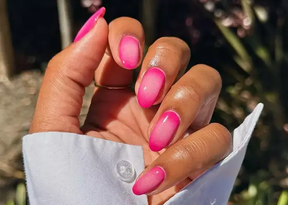 Pink aura nails with light pink in the center and hot pink outside