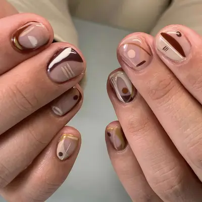 Abstract nude nail art on short nails