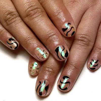 iridescent black swirl manicure