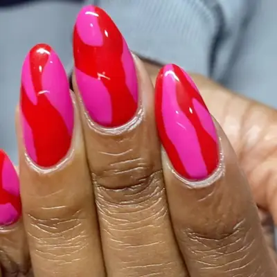 Pink and red swirl almond nails for summer