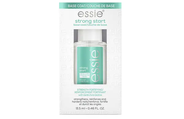Sally Hansen Double Duty Base & Top Coat, Hermes enamel base coat, and londontown nail hardener and base coat on a tan background