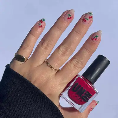 Naked nails with cherry nail art