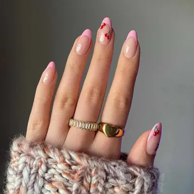 Pink French mani with cherry accents