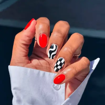 Red and black and white mismatched manicure