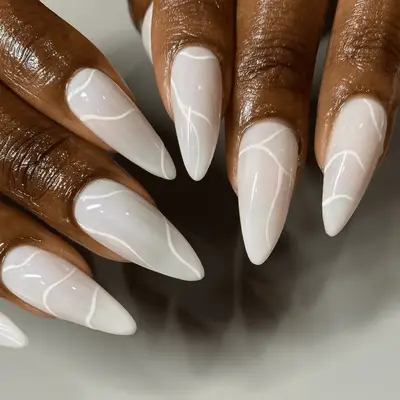 Long milky white nails with white lines