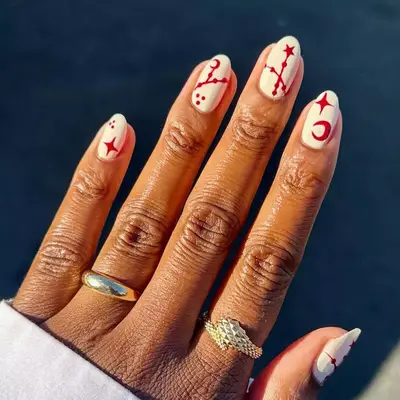 Red and White Witchy Nails - MYM Beauty Halloween Nail Ideas