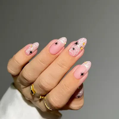White Web Nails - MYM Beauty Halloween Nail Ideas