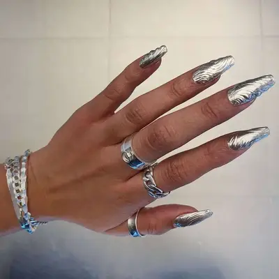 Silver Chrome Swirl Cyber Nails - MYM Beauty Cyber Nail Ideas