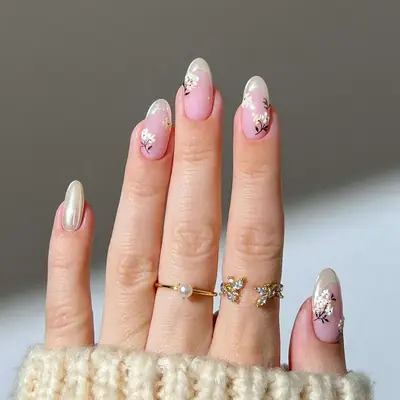 pearly white french manicure with floral nail art