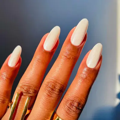 a solid white manicure topped with chrome