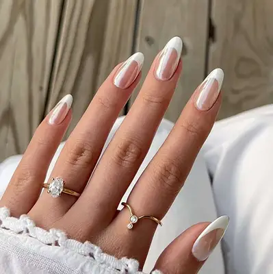 a french manicure topped with chrome 