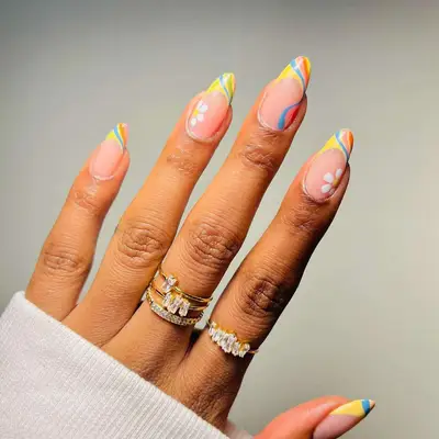 A pastel yellow French manicure