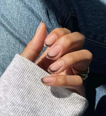 Short french manicure with brown tip and baby blue border