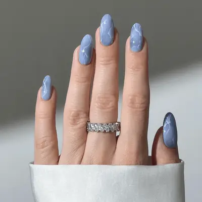 Baby blue nails with rhinestones 