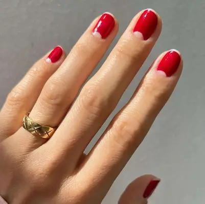 Close up of a manicured hand with clean, healthy cuticles