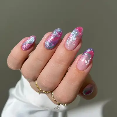 Marbled velvet nails with hints of pink and baby blue