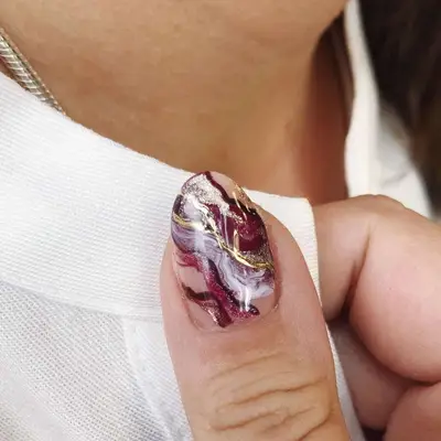 Marbled Maroon Nails with gold chrome accents