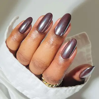 a chocolate brown chrome manicure