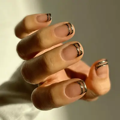 Hand Wearing Winter Nail Colors in Mocha