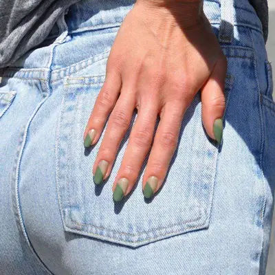 Hand Wearing Winter Nail Colors in English Green