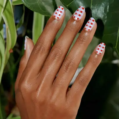 pink, red, and white plaid nails 