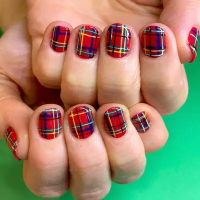 cream, red, and gray plaid nails