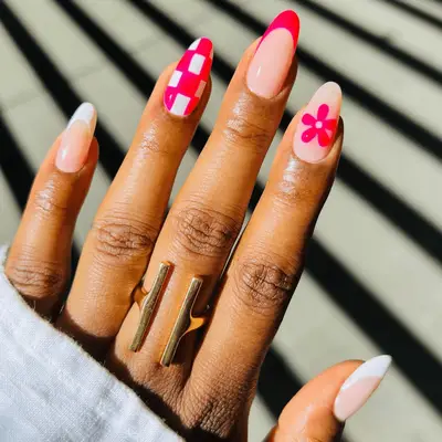 hot pink checkered print and single flower design with pink and white french tips