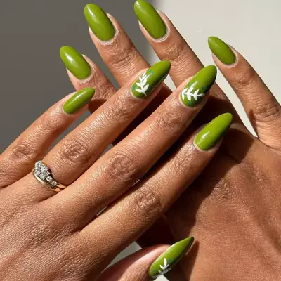 Lime green long nails with white vine detail