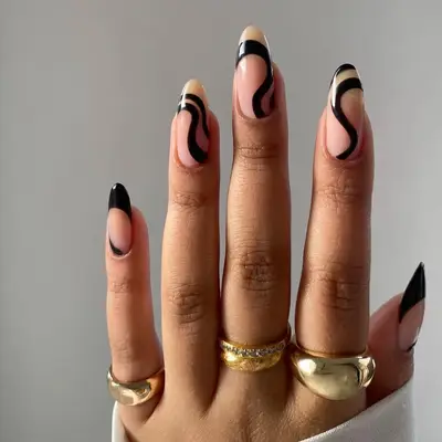 Round shaped neutral base with black curvy lines