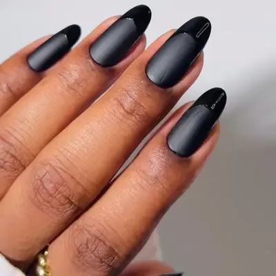 Black matte and gloss almond-shaped French tip nails