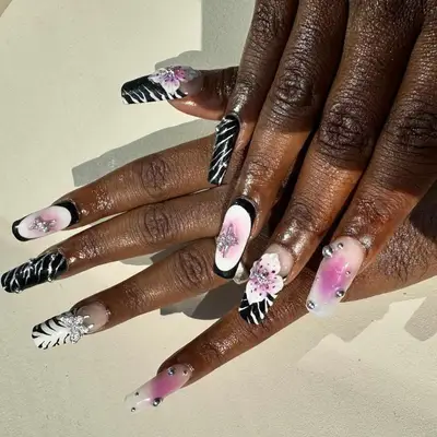 Black and pink maximalist nails