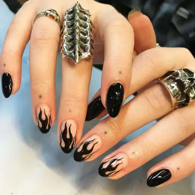 Black flames with neutral base and solid black nails
