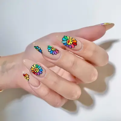 TAKASHI MURAKAMI rainbow flower nail art on nude nails - MYM Beauty Festival Nails
