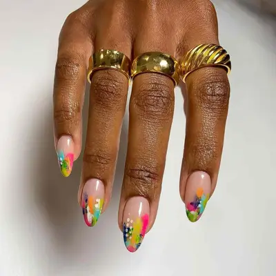 Almond-shaped nails with a multicolor paint-swatch abstract manicure - MYM Beauty Festival Nails