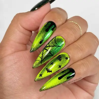 a green velvet manicure with web details