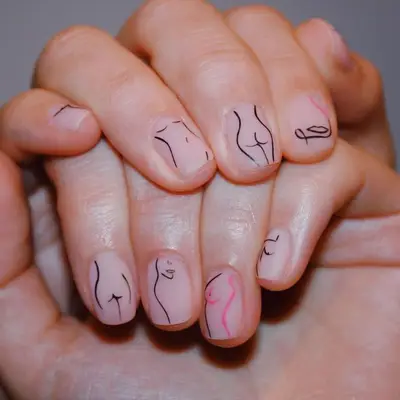 Matte black body outline nail design with pink accents