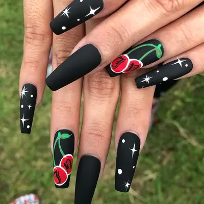 Matte black nails with cherry designs