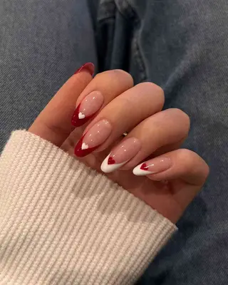 red and white French tips with tiny hearts