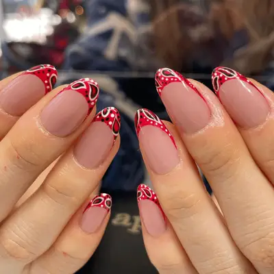 red metallic French tips with white hearts