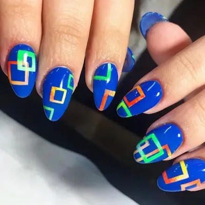bright blue nails with neon geometric art