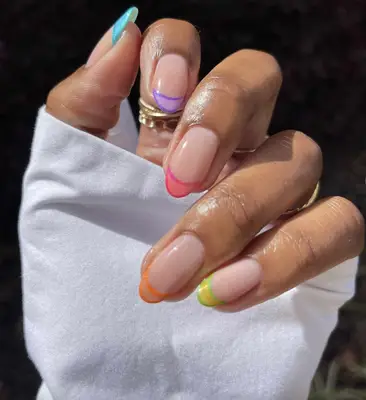 French manicure with rainbow neon french tips
