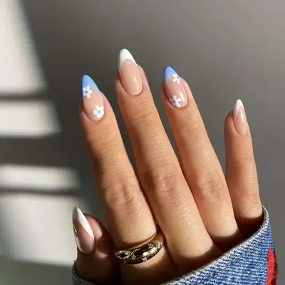 blue and white French manicure with flowers