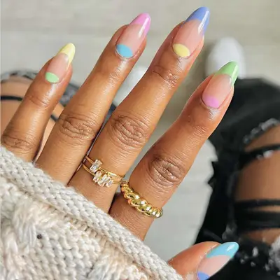 french manicure with pastel tips and moons