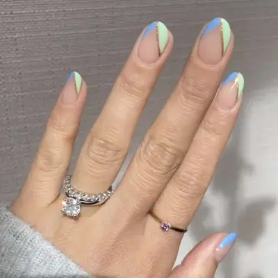 French manicure with green and blue chevron tips